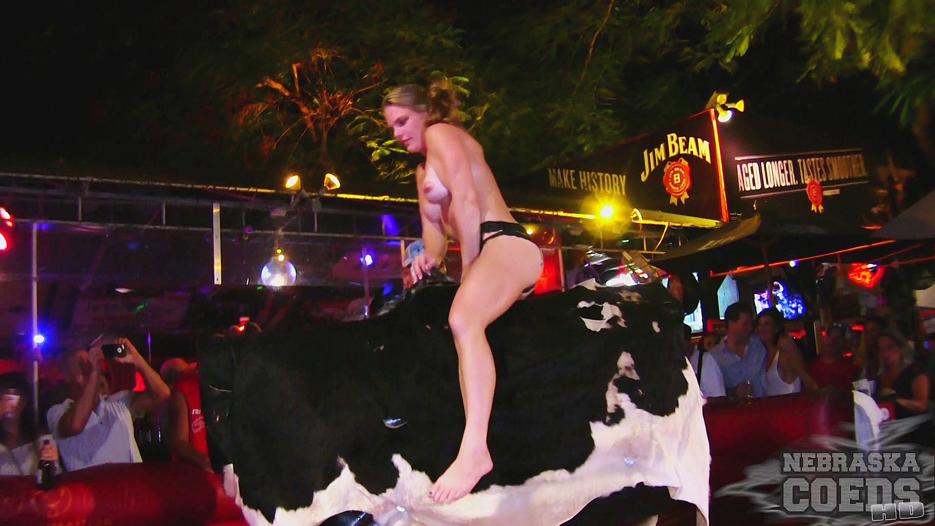Fantasy fest topless bull riding girls fan images.